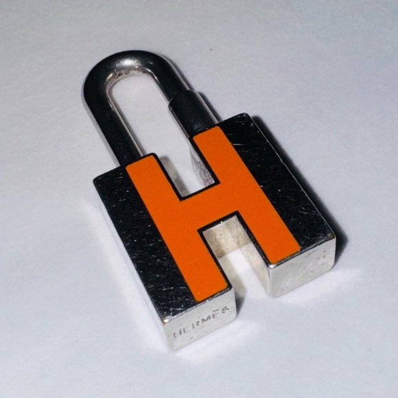 Hermes Silver and Orange Padlock Charm